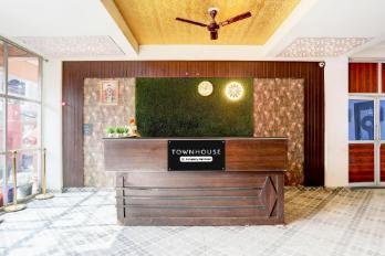 Reception desk with green feature wall